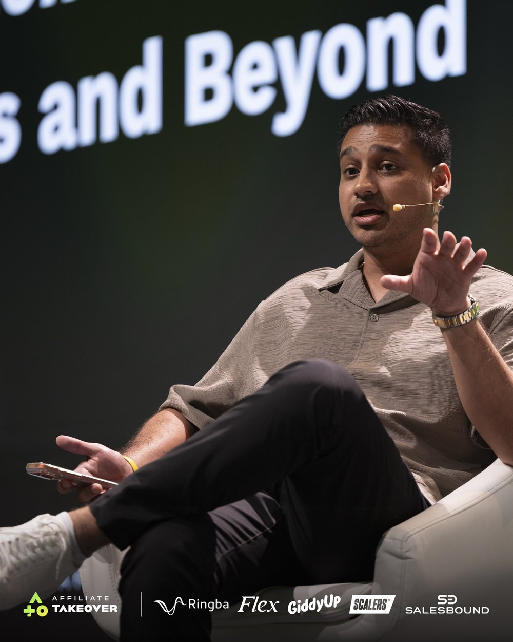 Samar Hussain speaking on stage at Affiliate Takeover Barcelona